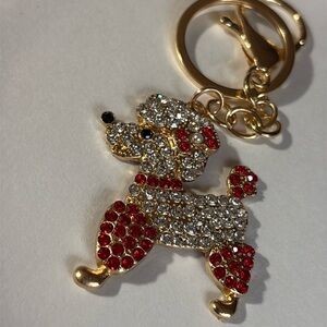 Sparkling poodle dog Keychain with red Accents